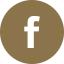 a white facebook logo on a brown background