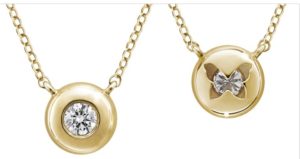 two gold necklaces with diamonds on them