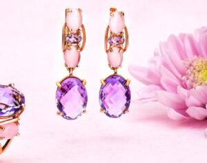 three different types of jewelry on a pink background