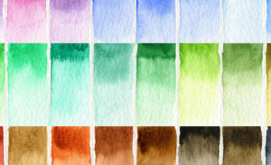 the colors of watercolors are arranged in rows