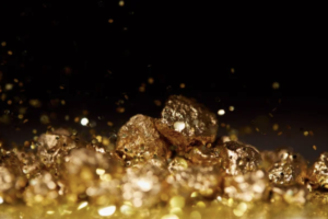some gold glitter is falling on the ground