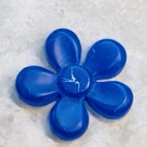 A simple flower design hand-carved in wax by a student at the New York Jewelry Design Institute.