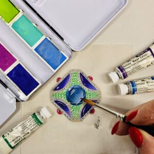 NYJDI student creating a traditional jewelry design rendering in gouache watercolor.